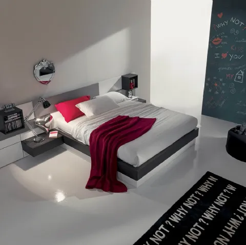 Letto in legno e laccato con testiera a boiserie modulare e contenitore Plan di Fimar