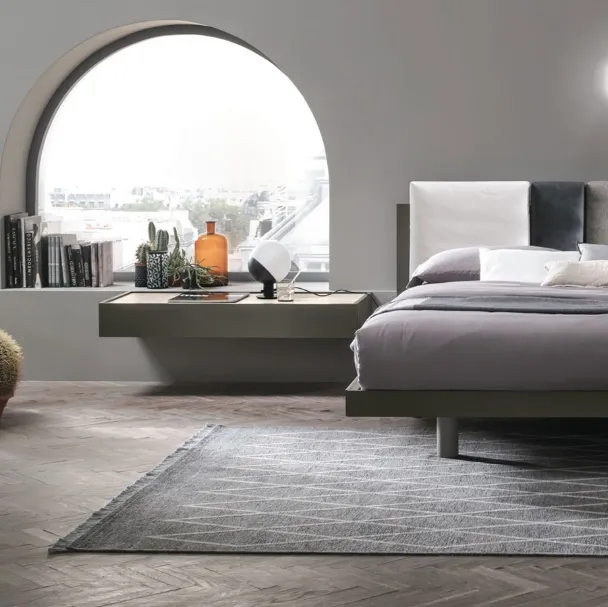 Letto con testiera in ecopelle e legno Nikki di Tomasella