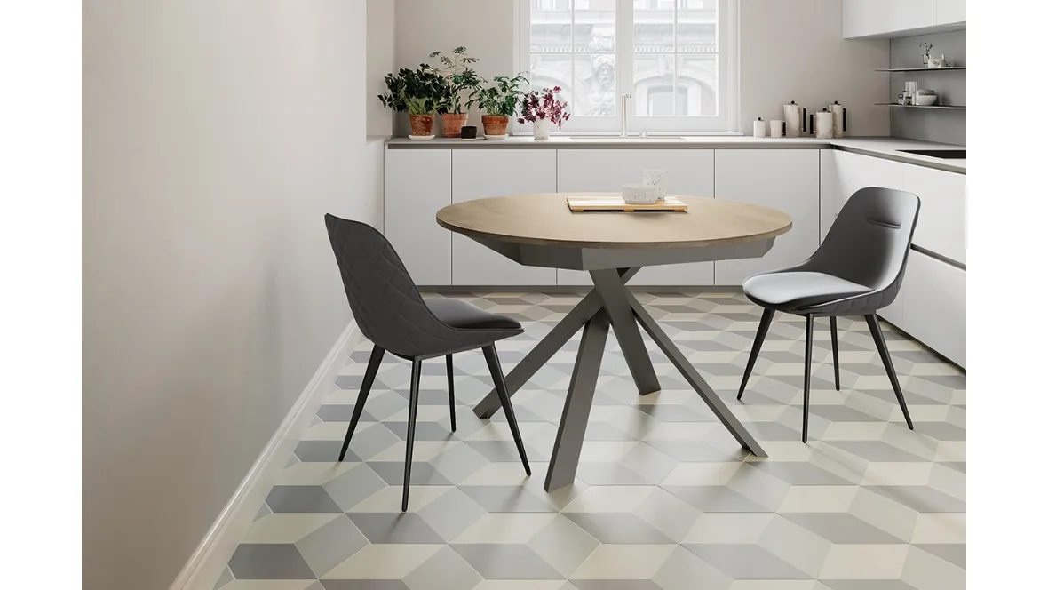Tavolo rotondo allungabile Twist con top in laminato e gambe in metallo verniciato di Arredo3