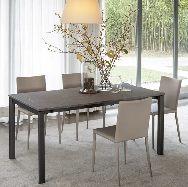 Tavolo allungabile con top in ceramica Compasso di Altacom